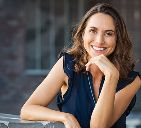  A young professional woman smiling with a new set of veneers