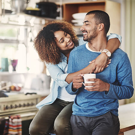 man and woman smiling at each other