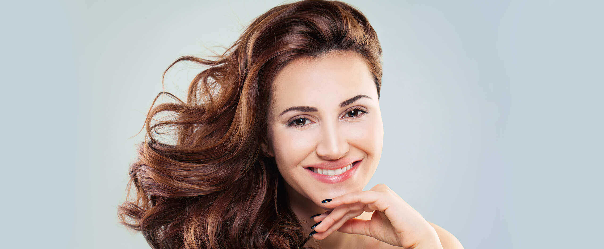 woman with beautiful white smile Cosmetic Dentistry Leesburg Family Dental dentist in Leesburg, Virginia Dr. Ali Mualla