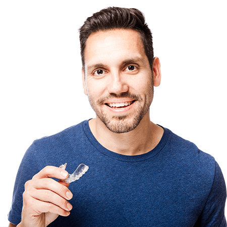 smiling man in holding mouthguard